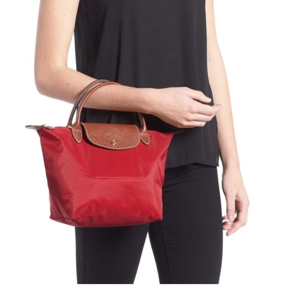 Longchamp Handbags - Small Le Pliage Longchamp bag in red